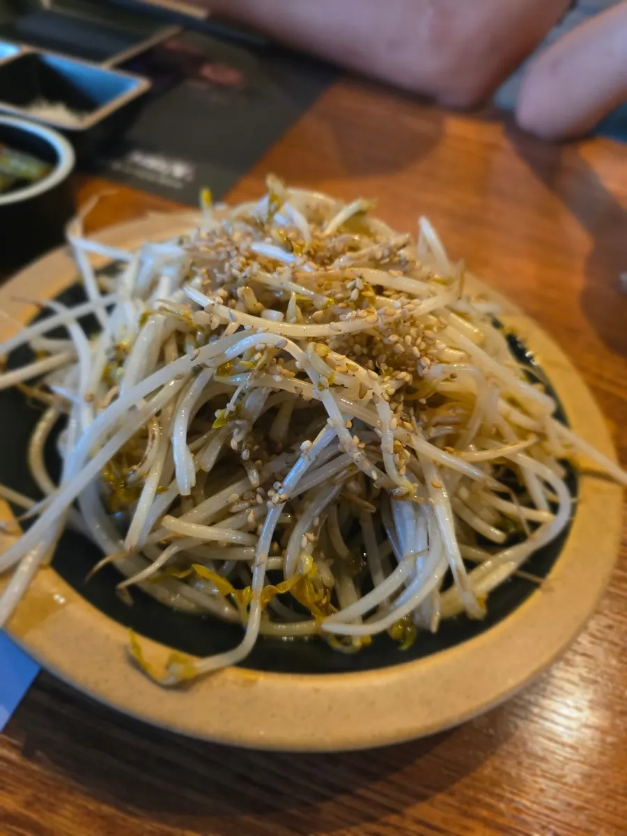 Complimentary plate of stir-fried mung bean sprouts