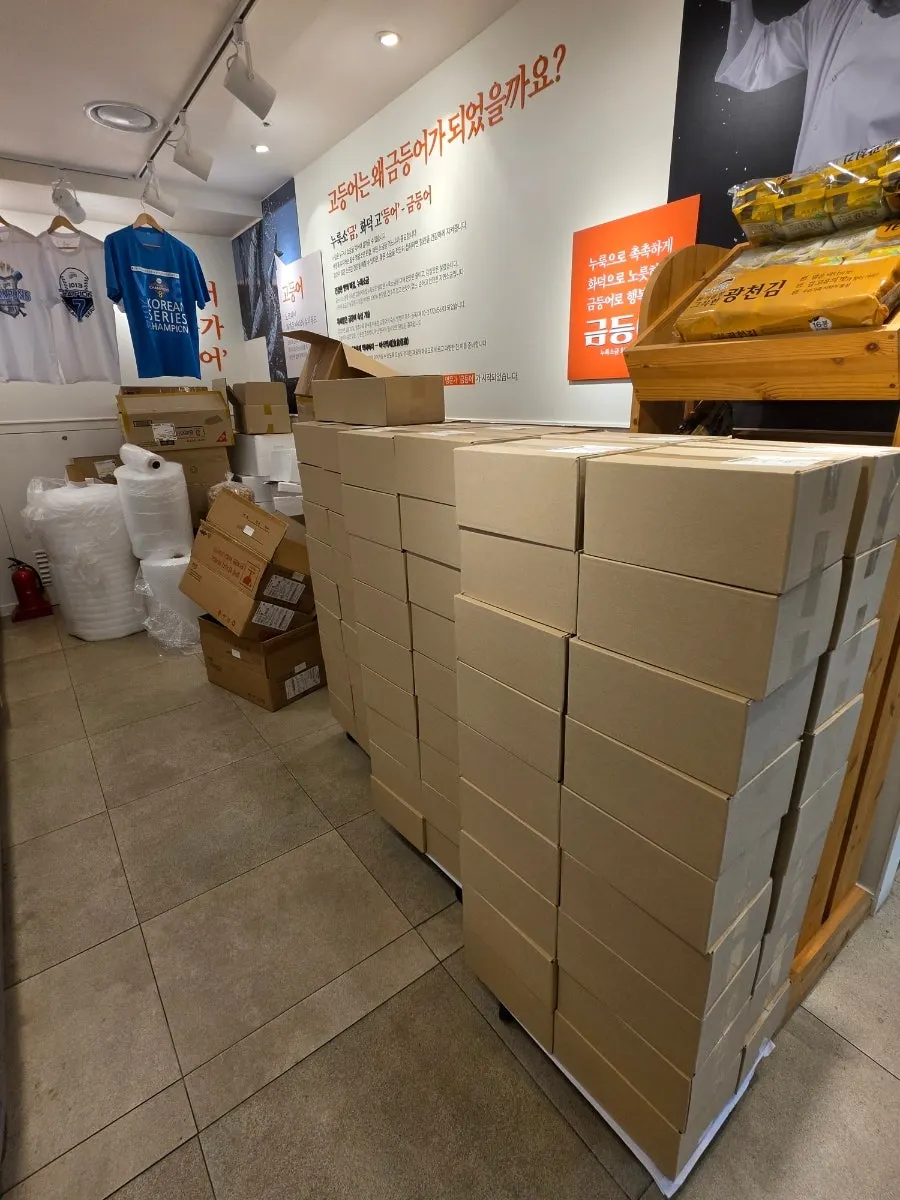 Chuseok fish gift sets being packed
