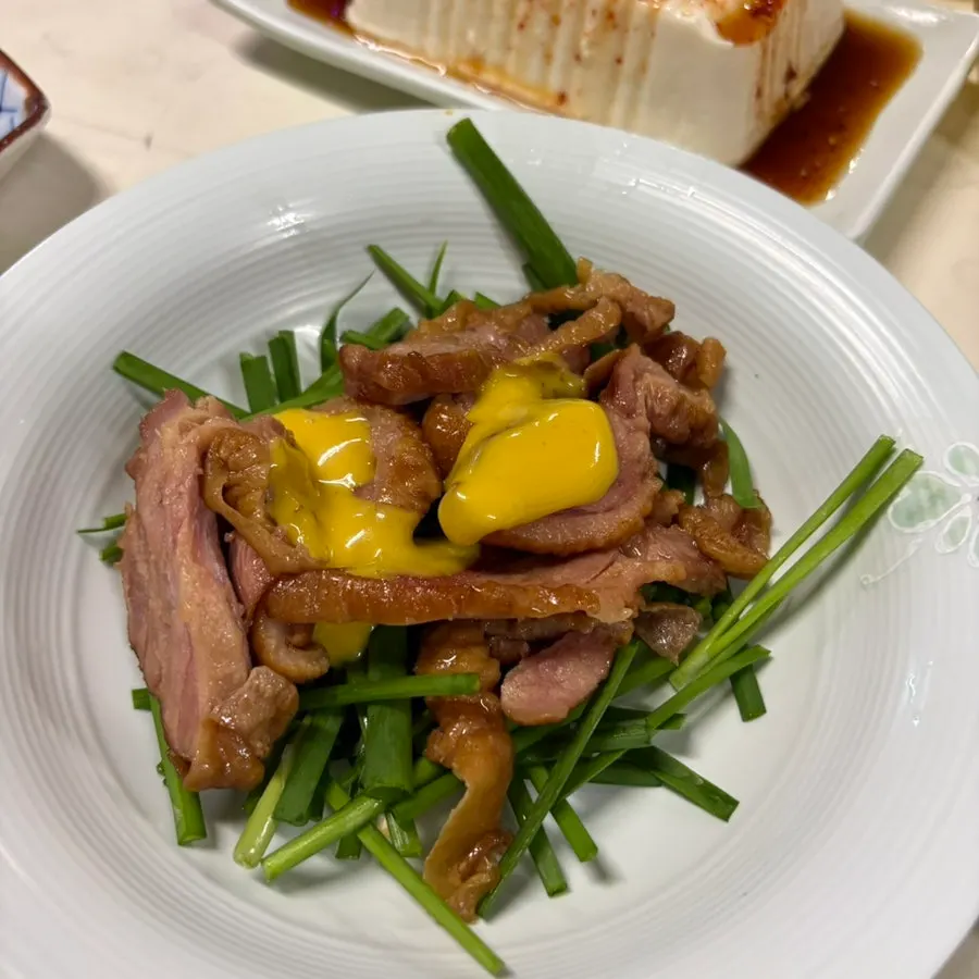 Warm dishes including boiled pork and minari shrimp pancake