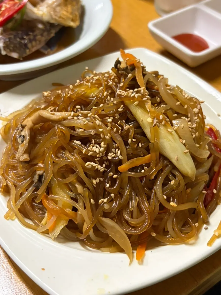Japchae and side dishes from the uncle course