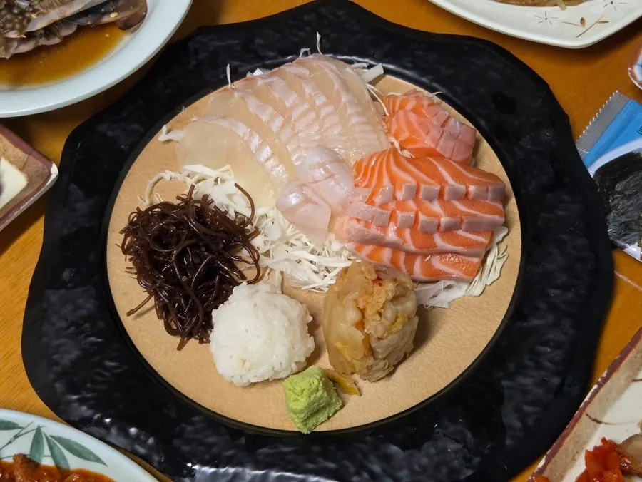 Wide shot of the table filled with side dishes