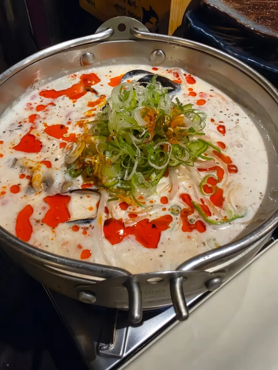 Scooping up cream jjamppong broth