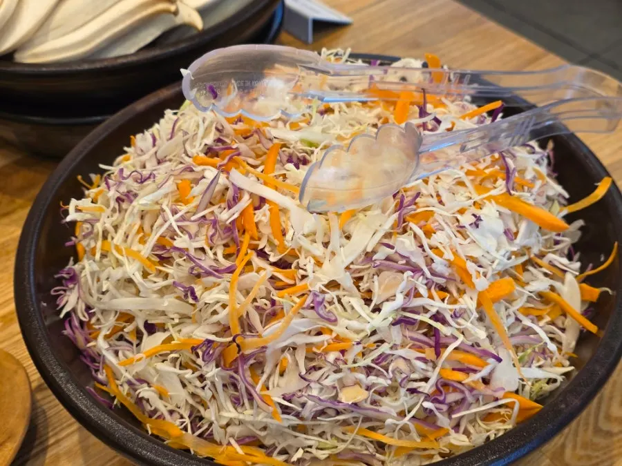 Ssamjang and sesame oil set out at the self-serve bar