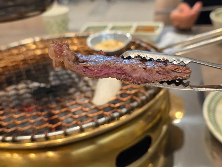 Cross-section of medium-rare grilled flower marbled ribeye
