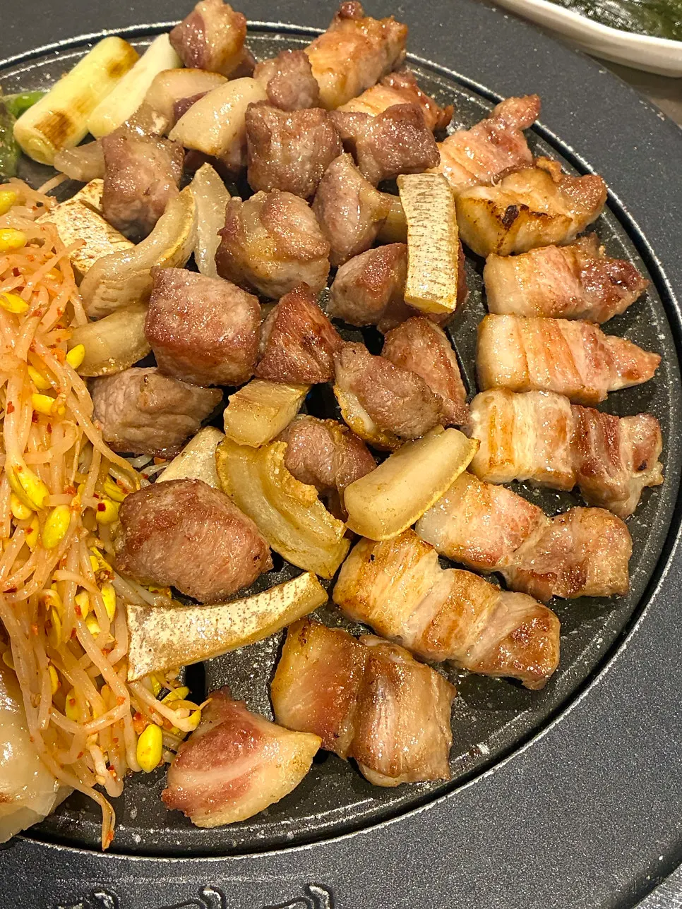 The platter's pork belly, pork neck, and pork skin