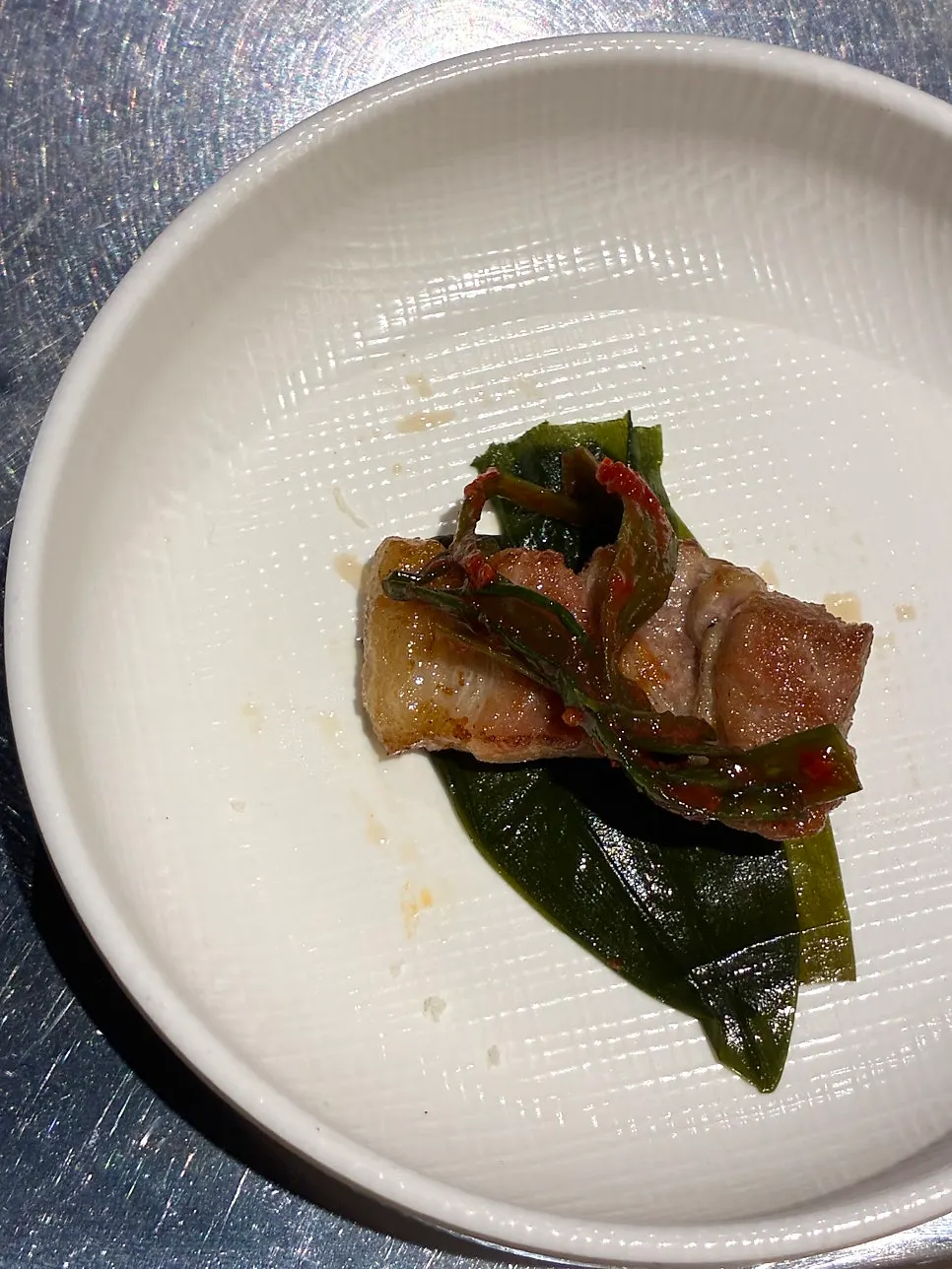 Meat paired with sauce and breadcrumbs