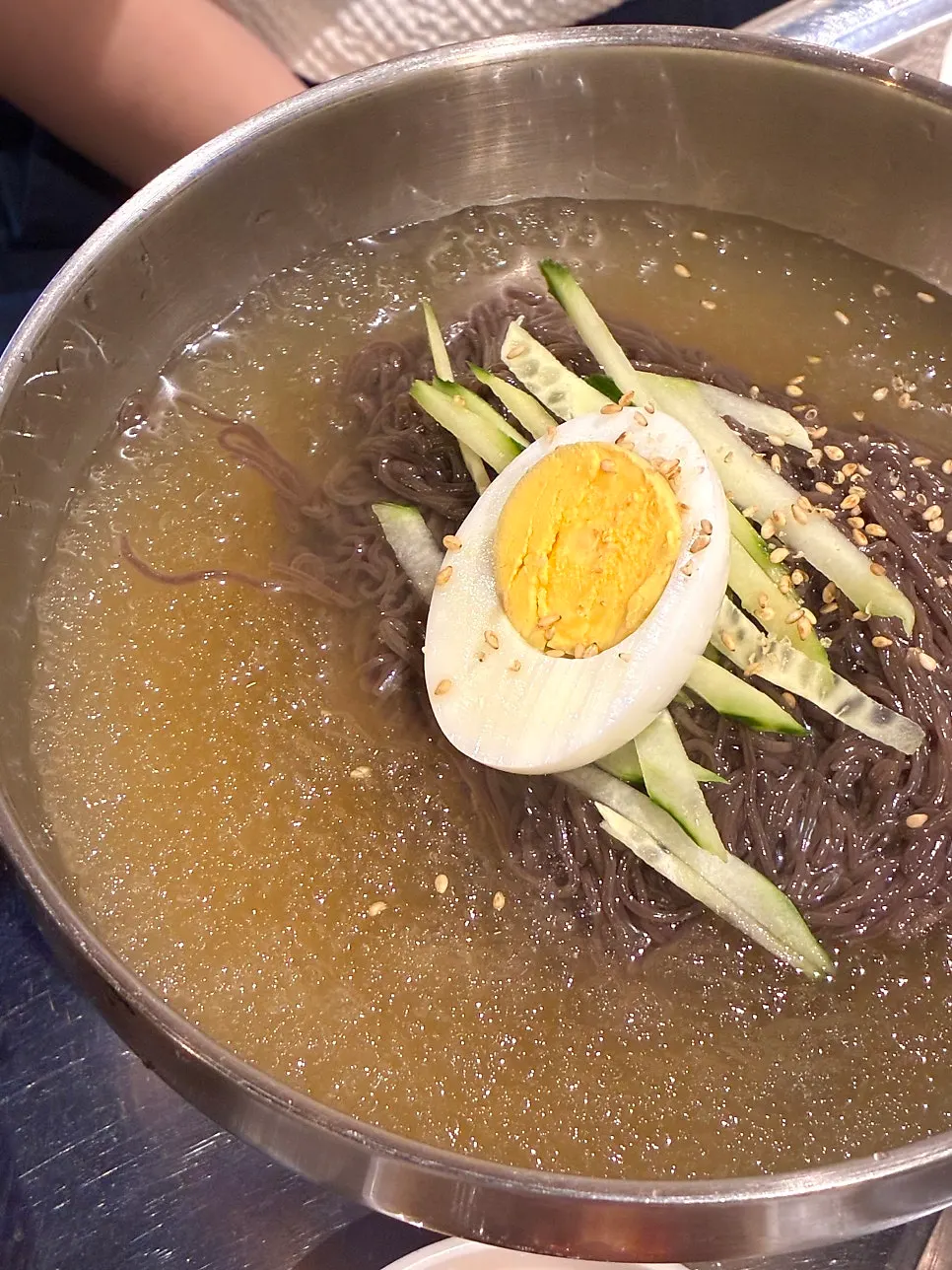Doenjang sulbap served bubbling in a stone pot