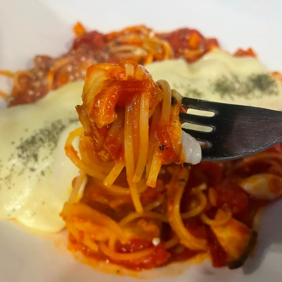 Pasta topped with mozzarella cheese