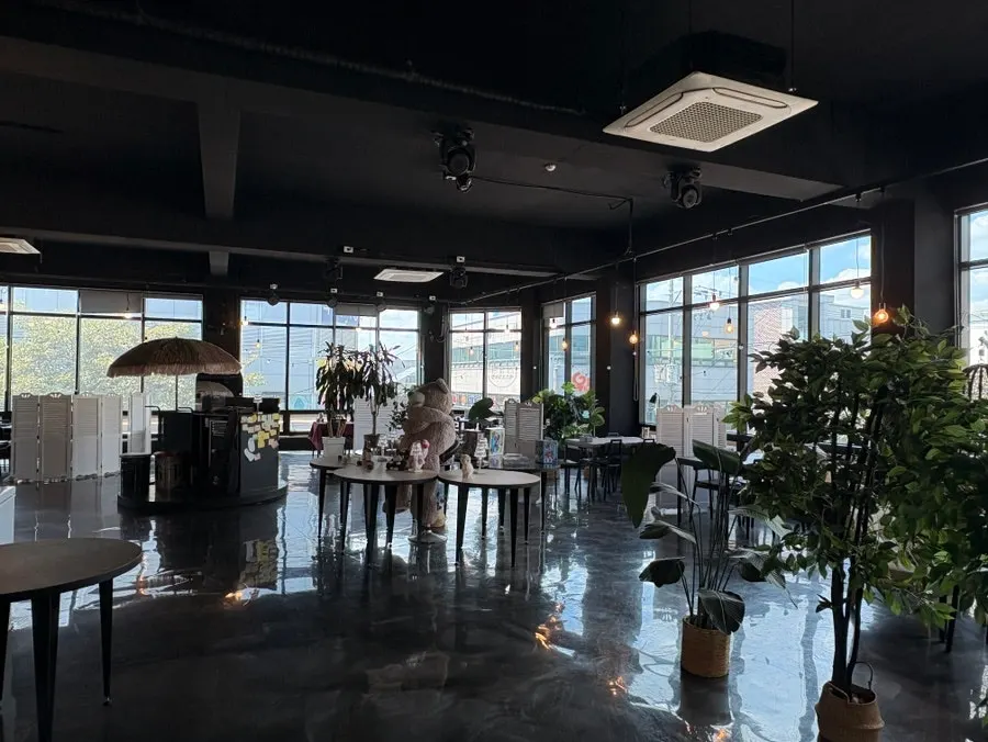 Restaurant interior with floor-to-ceiling windows