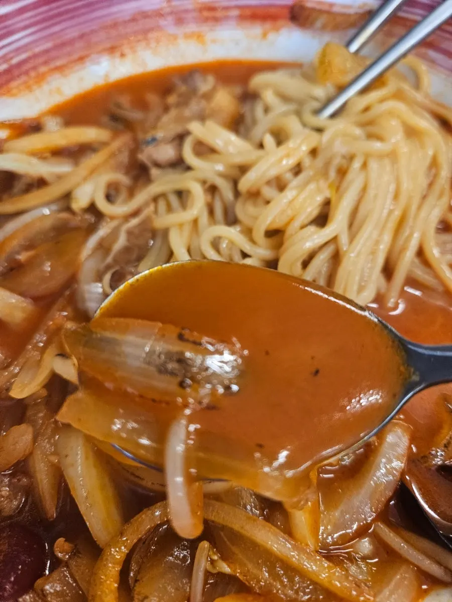 Close-up of chadolbagi jjamppong packed with ingredients