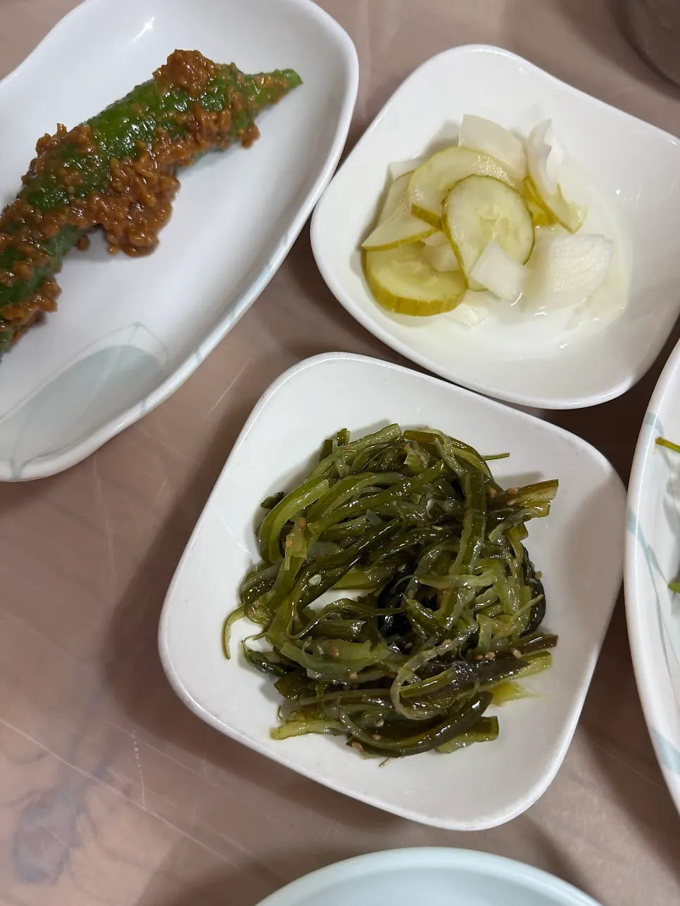 Jjimgoeul side dishes including stir-fried miyeok julgi