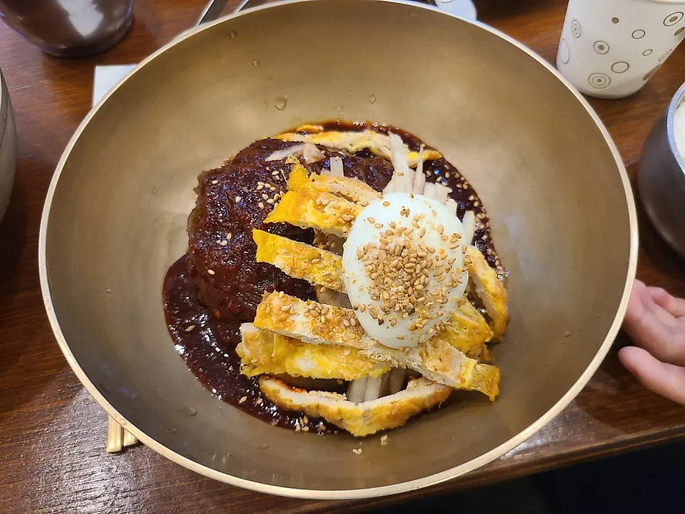 Mixed naengmyeon topped with the specialty sauce