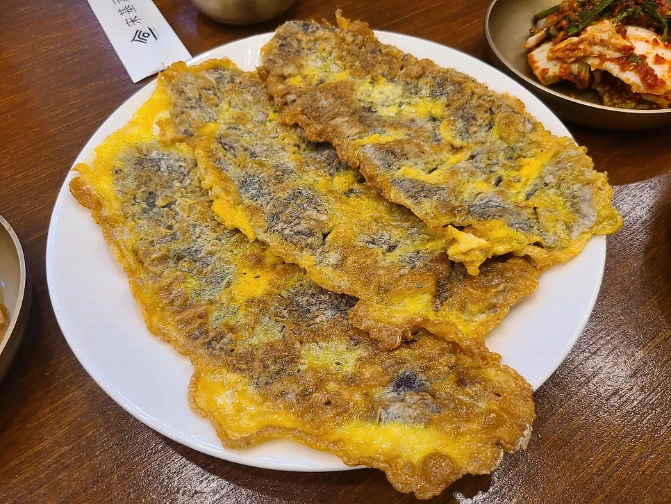 A plate of beef yukjeon made with 1++ Korean beef