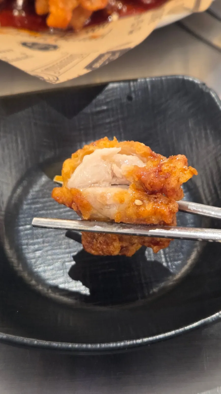 Close-up of a piece of soy sauce chicken