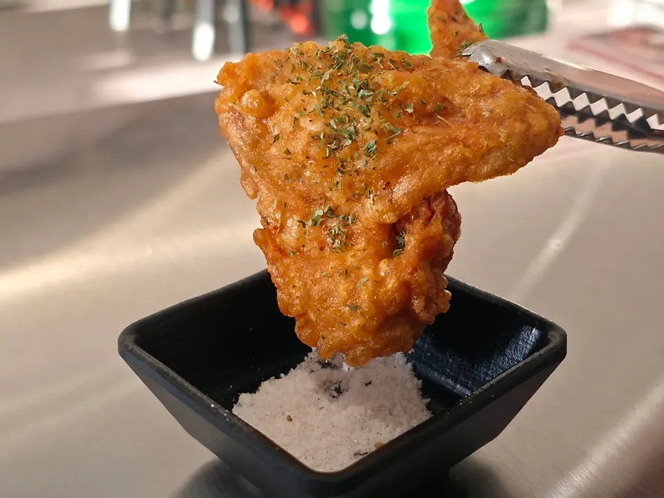 A piece of golden fried chicken