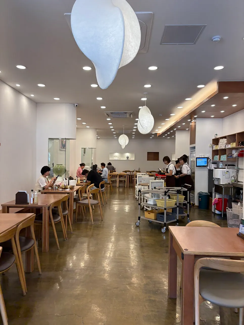 Dining hall seating at Songgiwon Jinju Naengmyeon Direct Store