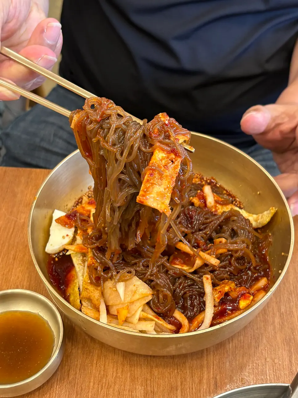 Nongae 1593 bibim-naengmyeon topped with yukjeon garnish