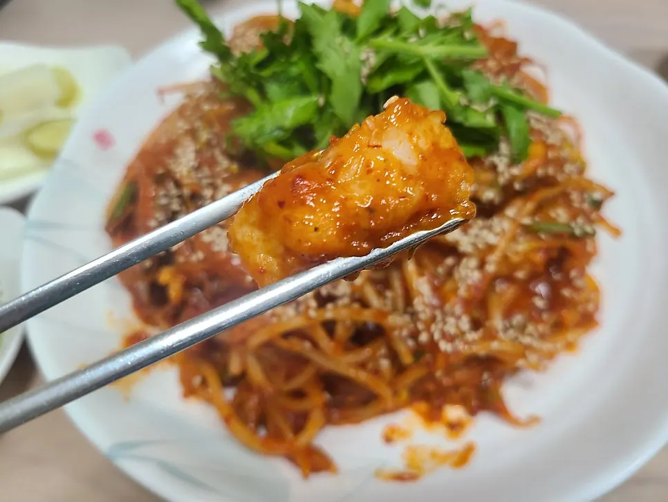 Boneless monkfish meat topped with sauce