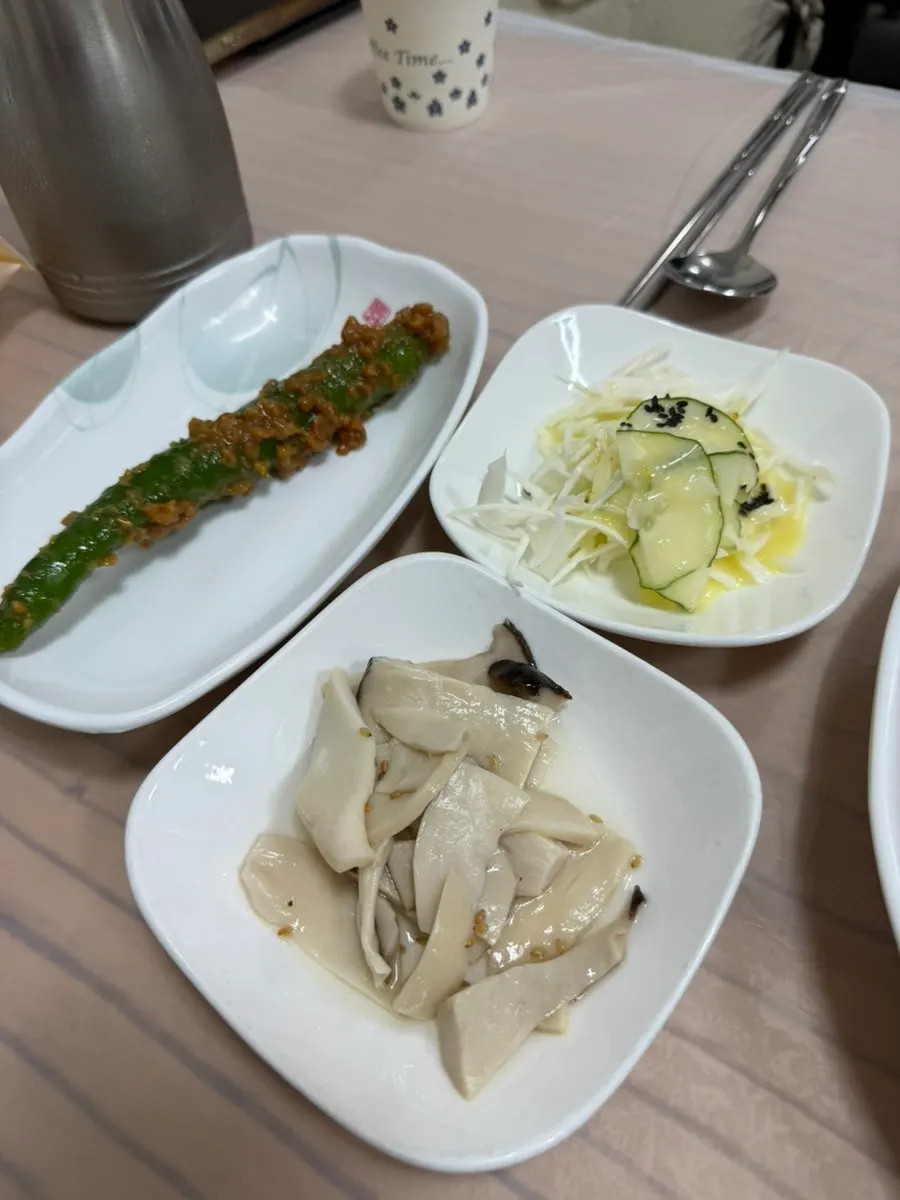 Side dishes set on the table at Jjimgoeul