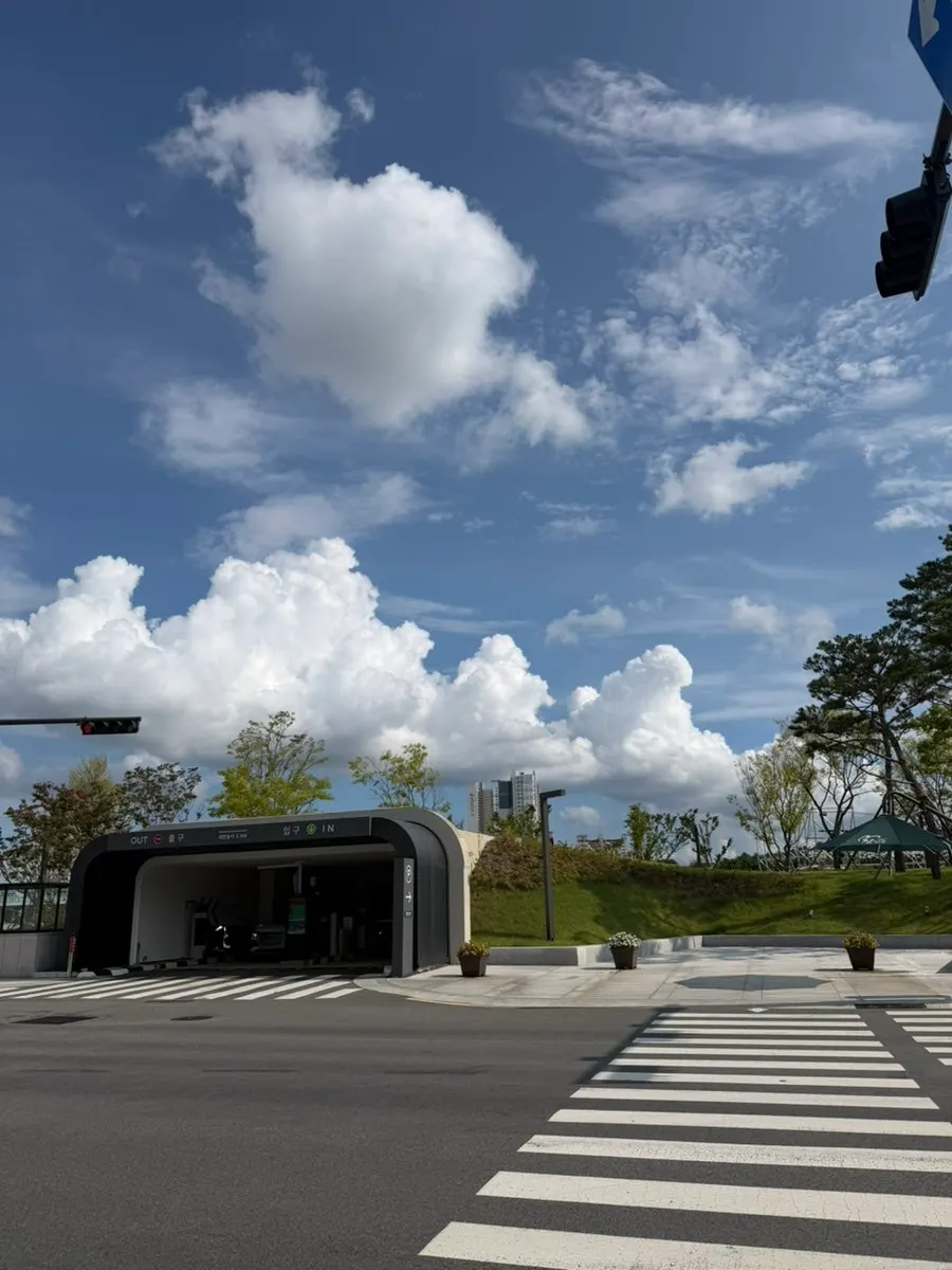 Crosswalk leading from Jinju Daecheop History Park underground parking to Jjimgoeul