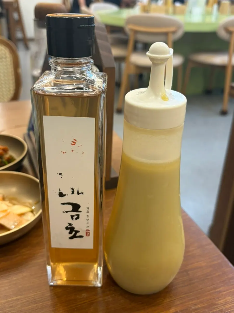 Mustard and vinegar prepared on the table