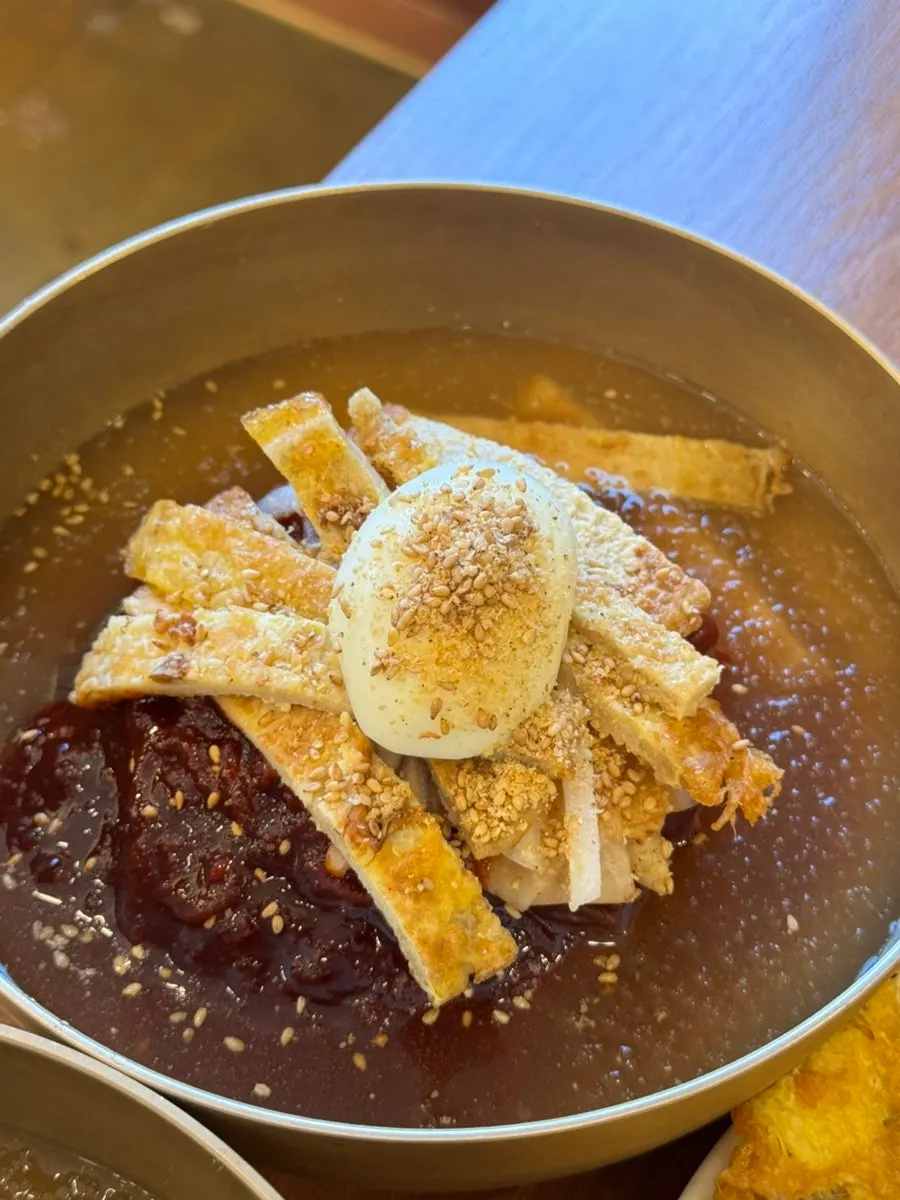 A bowl of mul-naengmyeon broth