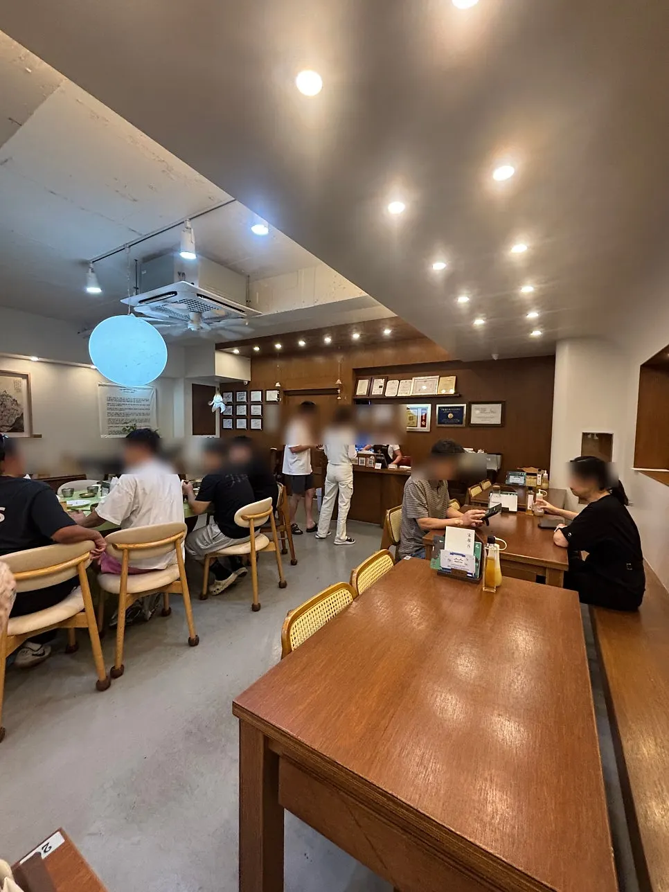 Dining hall interior of Song Giwon Jinju Naengmyeon Main Branch in the evening