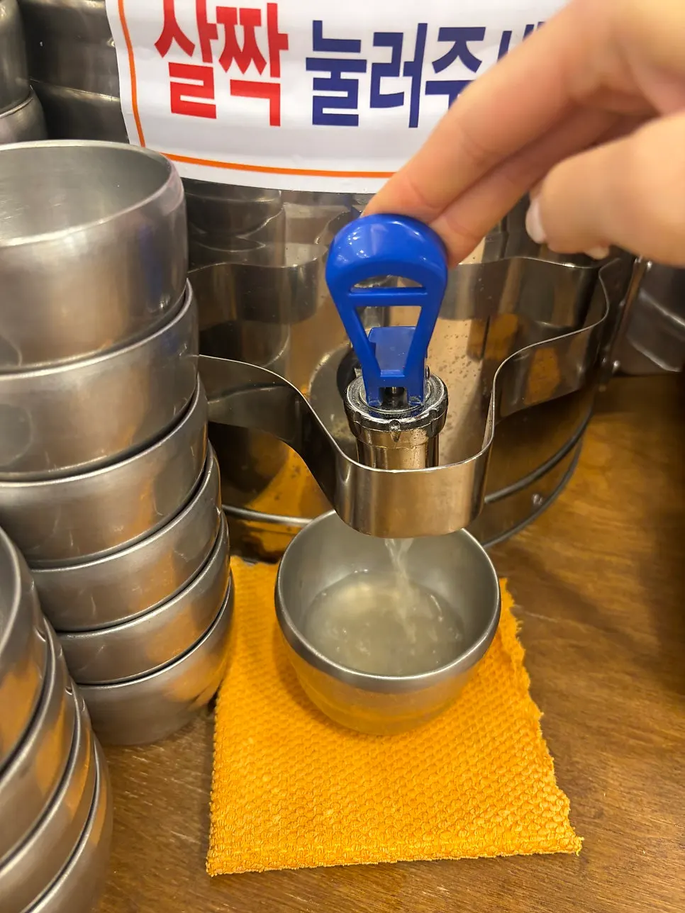 Pouring and drinking the warm broth