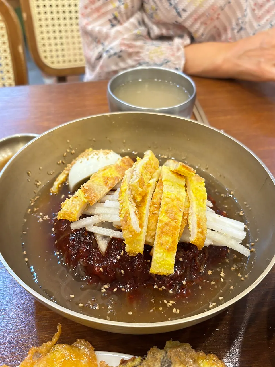 Table spread with yukjeon and side dishes