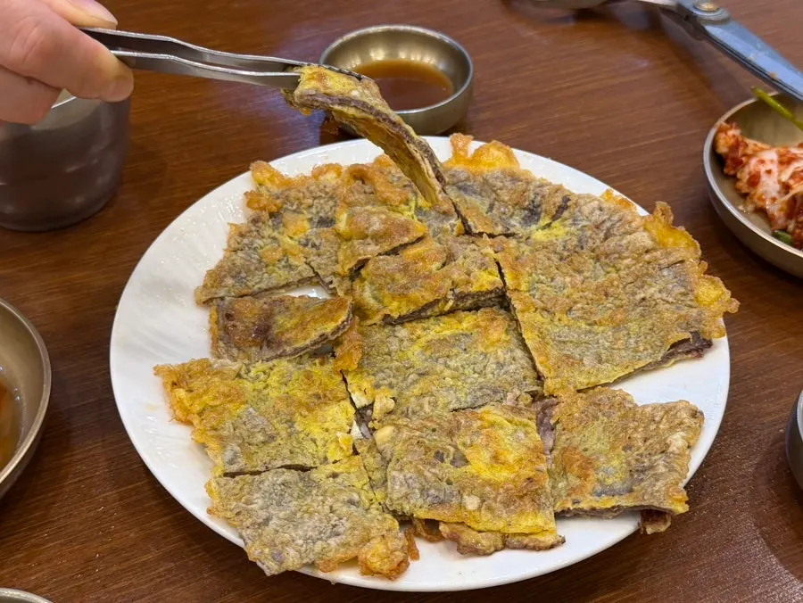 Close-up of egg-coated ujeon beef pancake