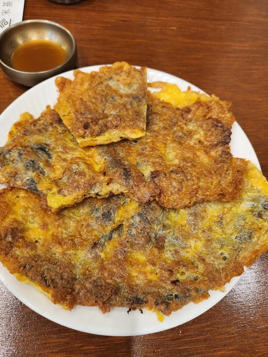 Ujeon yukjeon with pickled onions and house sauce