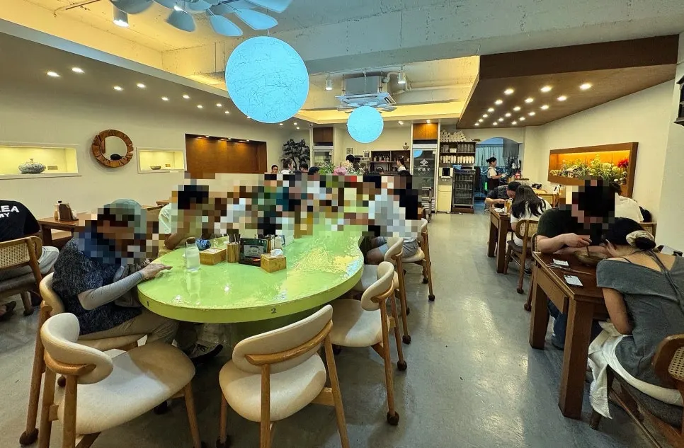The fully booked interior on a weekday lunch