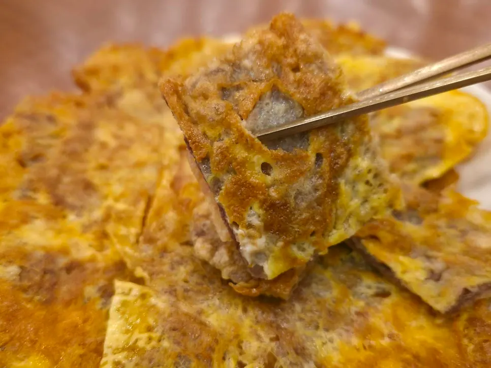 Close-up of wujeon pan-fried in buckwheat flour