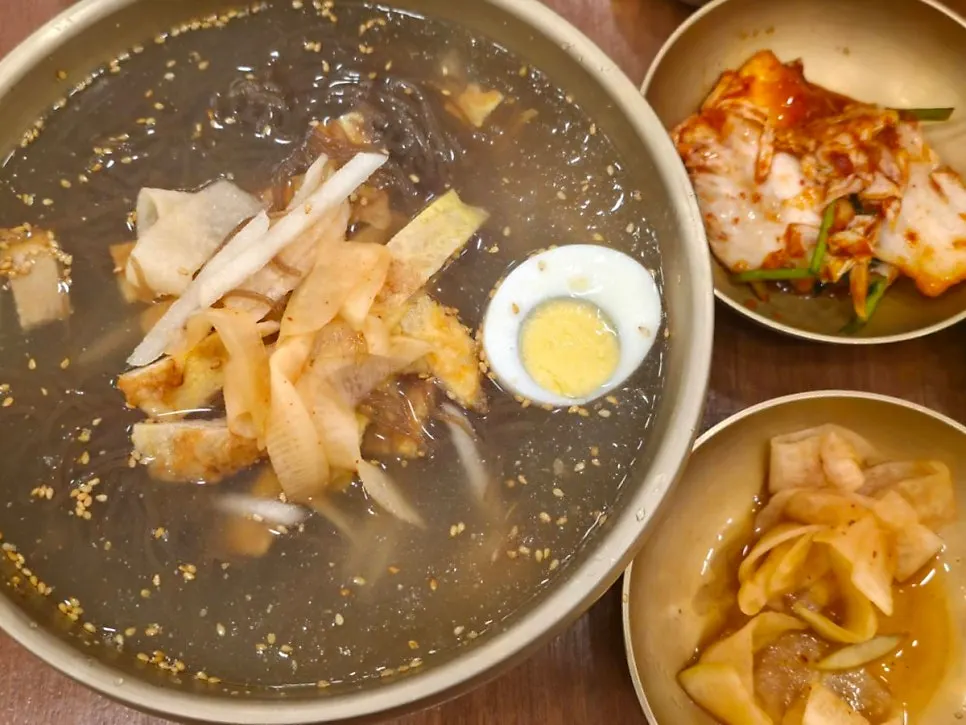 Savory Jinju naengmyeon broth with noodles