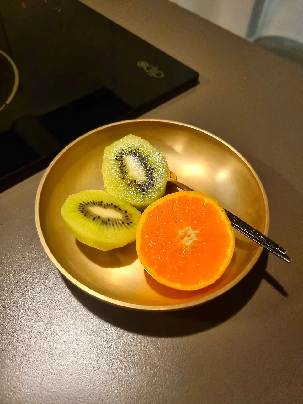 Kiwi and orange served for dessert