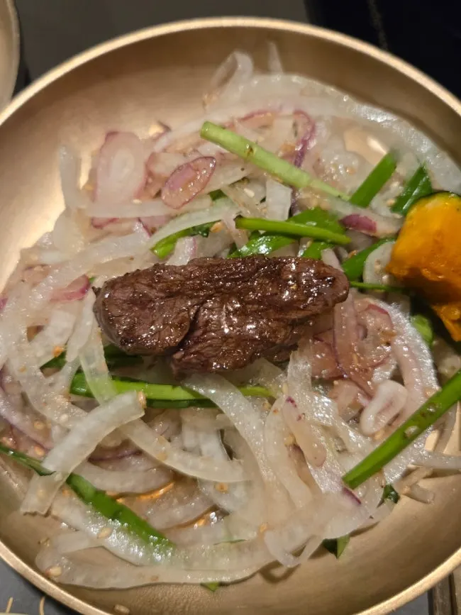 Full spread of Psyche's beef feast