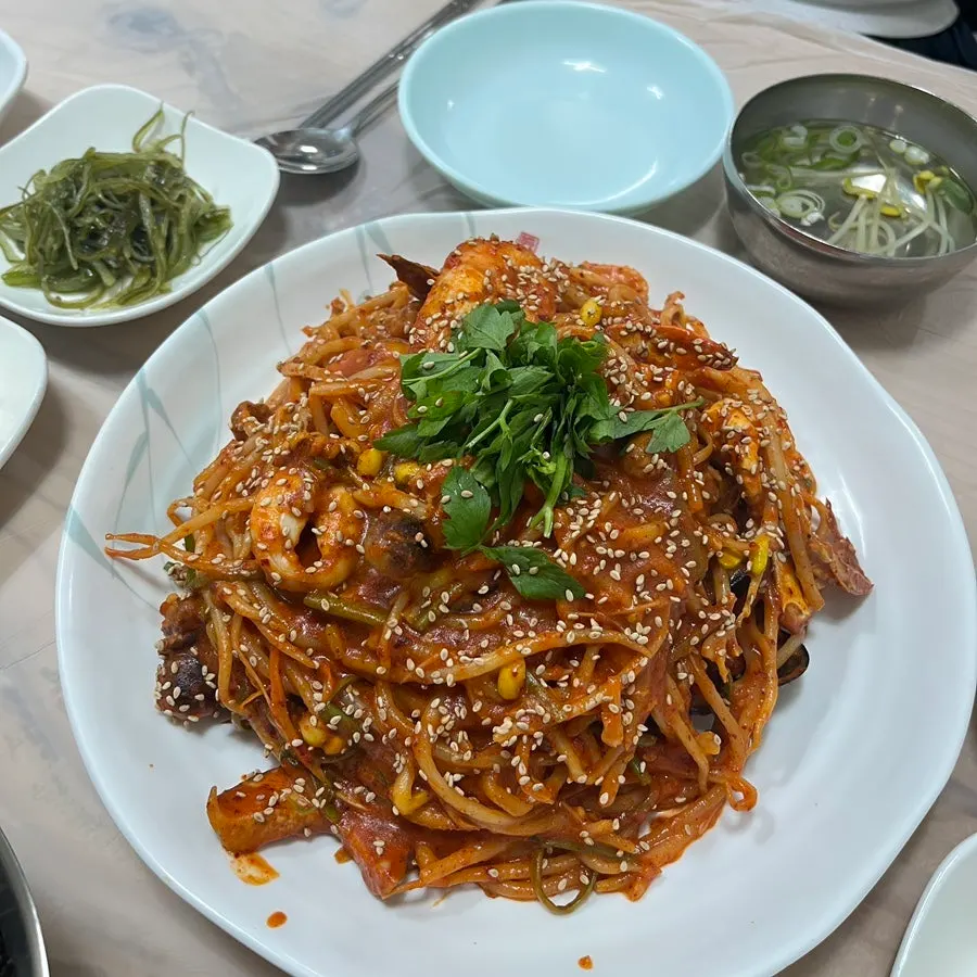 Close-up of the red-seasoned seafood assortment jjim