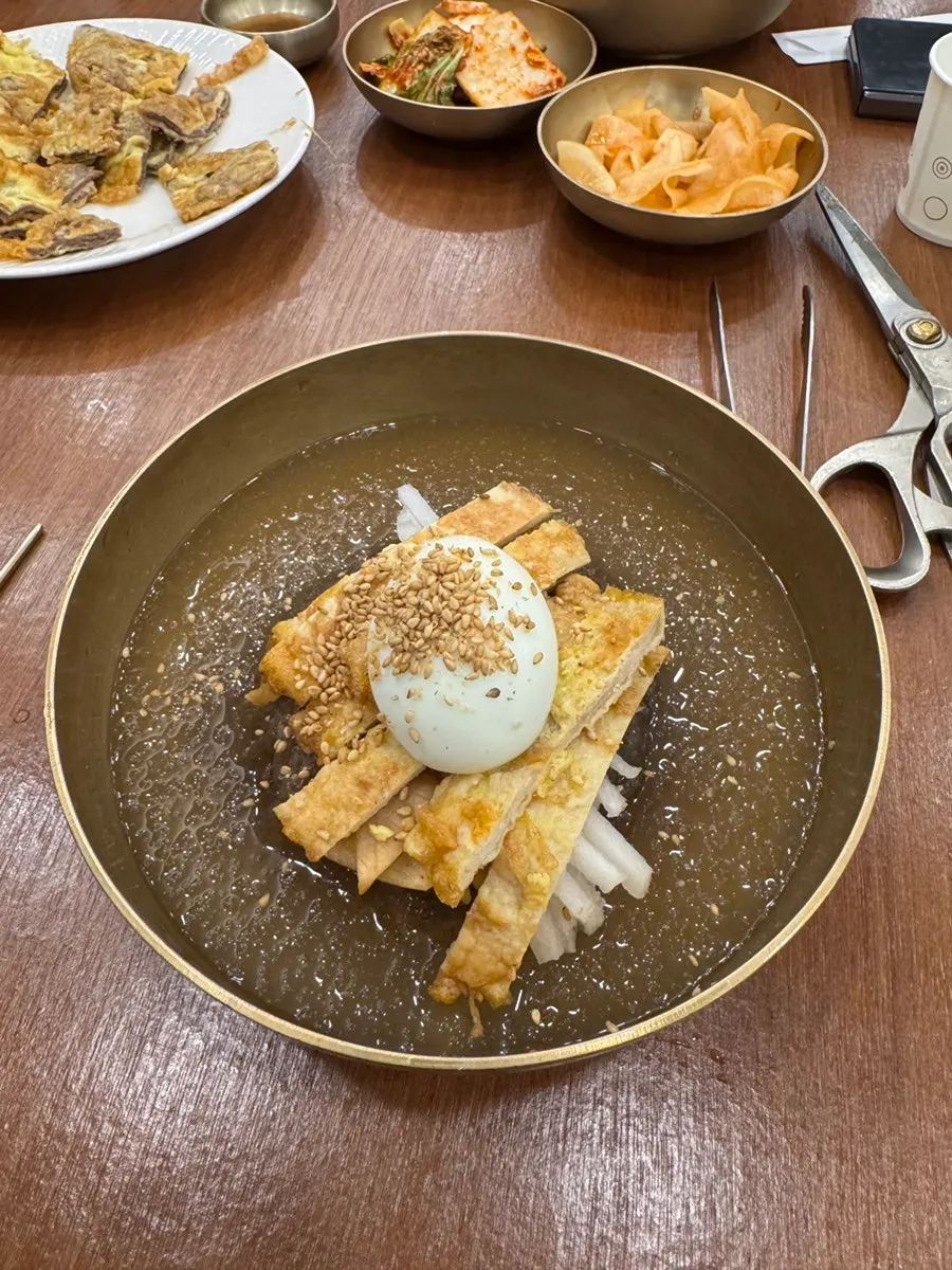 Jinju water naengmyeon topped with fine ice flakes
