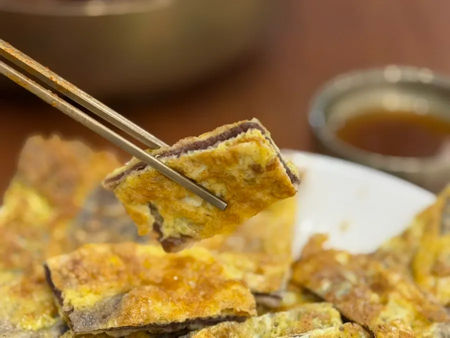 A piece of self-cut Korean beef yukjeon