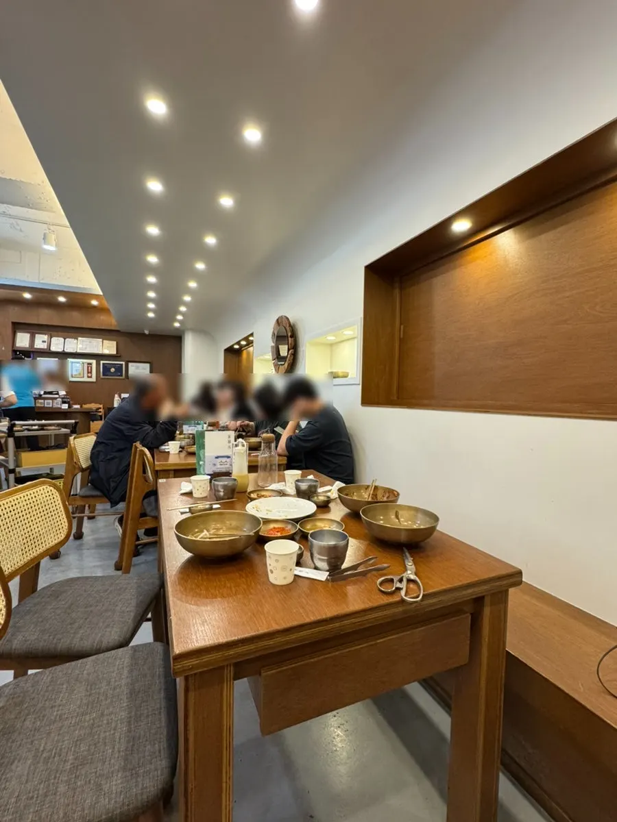 Interior of Song Giwon Jinju Naengmyeon Main Branch filled with customers