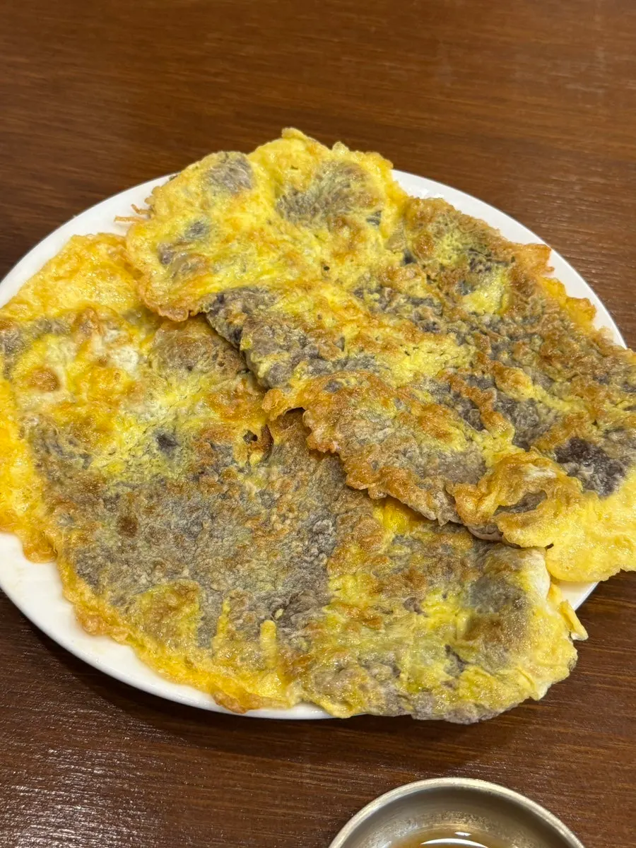 A piece of egg-coated yukjeon