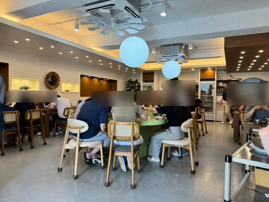 Interior of Song Giwon Jinju Naengmyeon Main Branch during early lunch