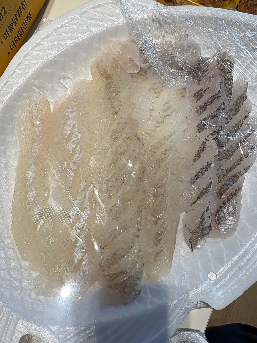 Flounder and rockfish sashimi platter plated at our accommodation