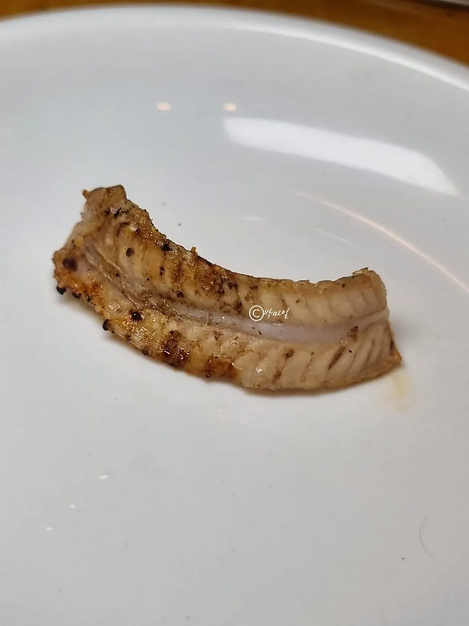 Close-up of seasoned grilled wild hagfish