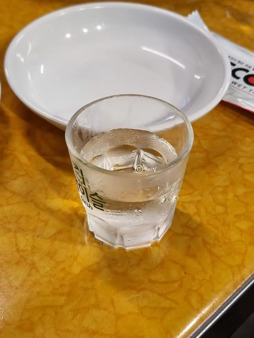 Glass of beer served alongside the food