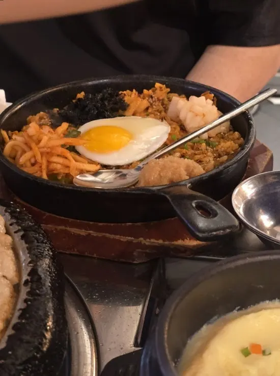 Soju glass and gopchang grill pan on the table