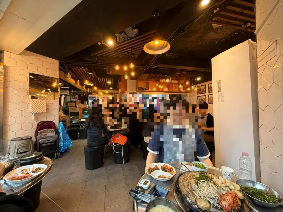 Interior of the gopchang restaurant with round tables