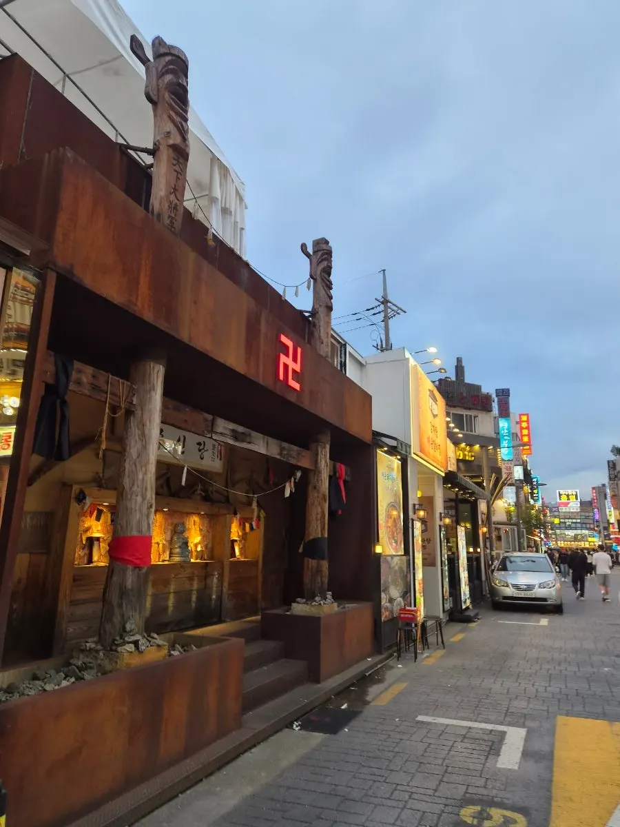 Shops along the main street in the middle of Bangi food alley