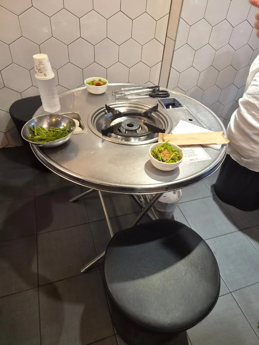 Table set up after ordering one portion each of hanwoo gopchang and daechang