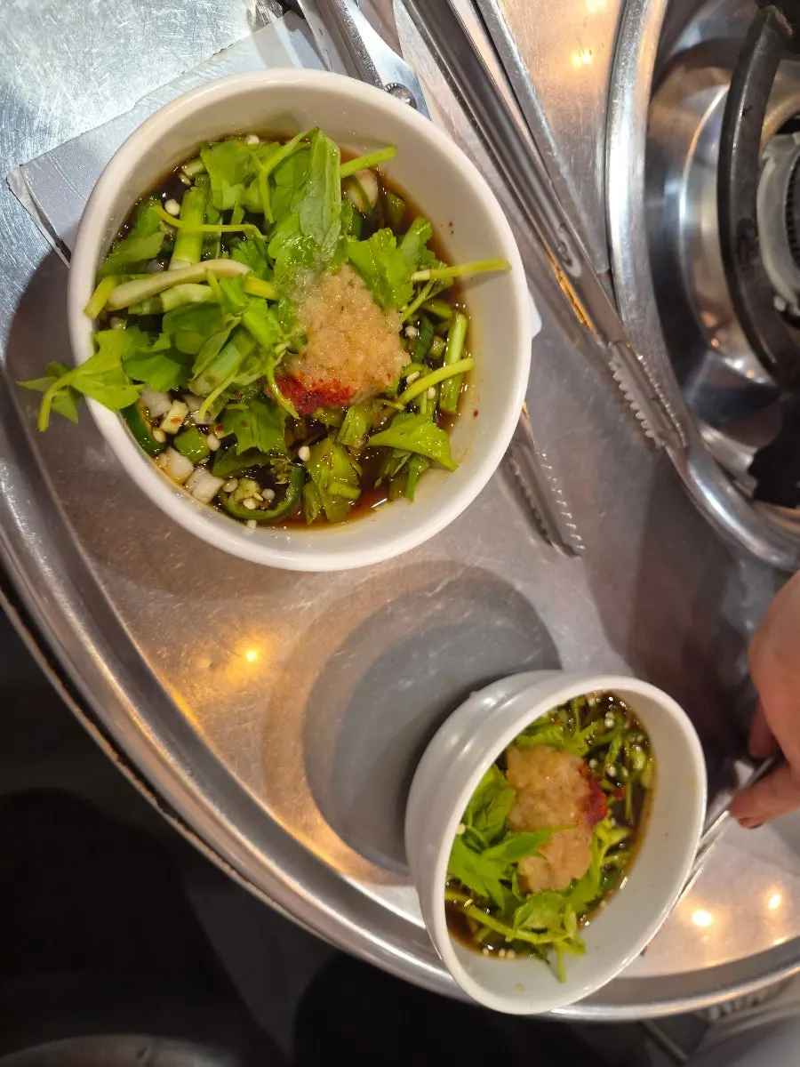 Close-up of the minari garlic sauce dish